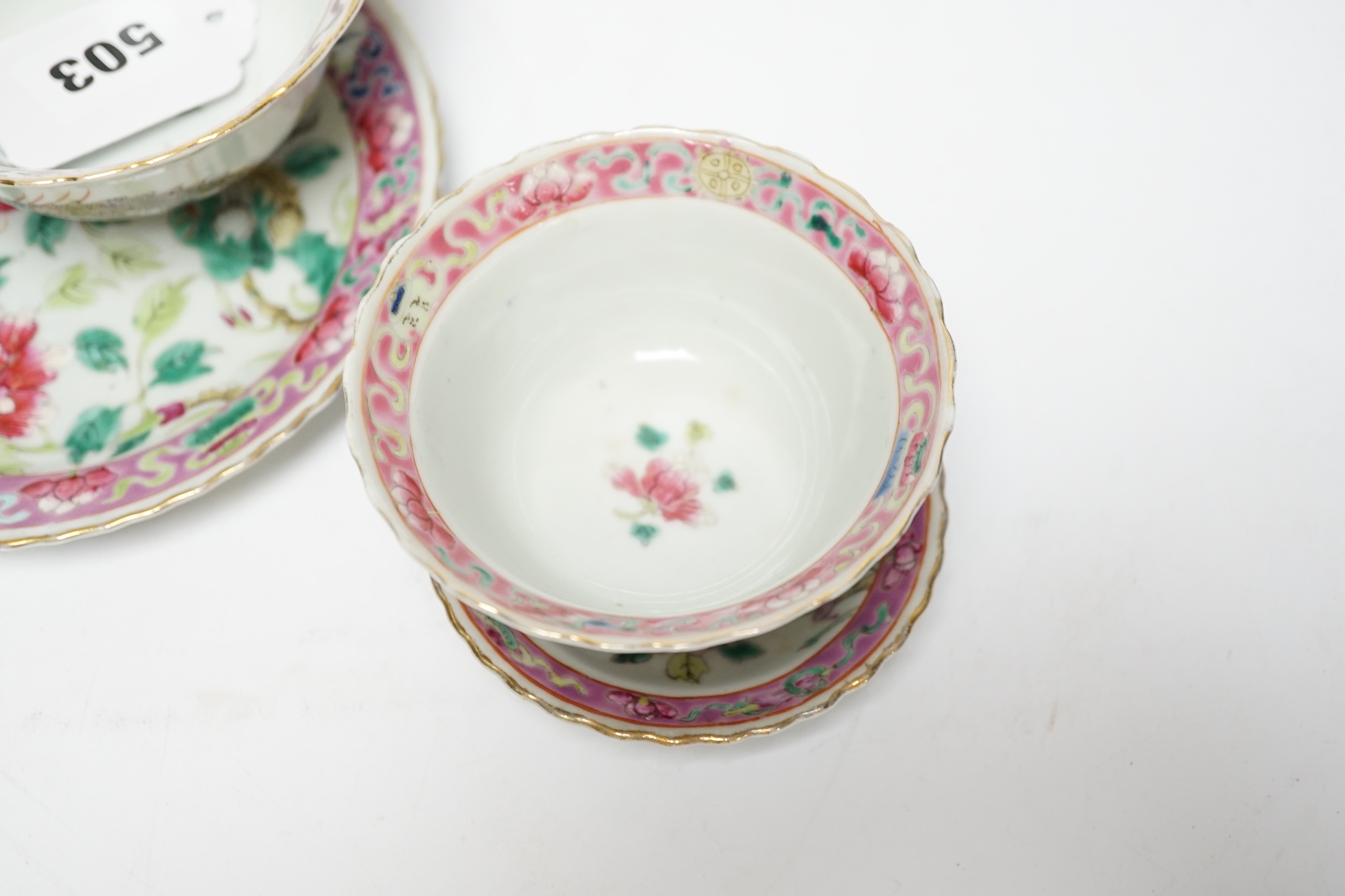 Two Chinese Straits Nonya ware famille rose tea bowls, larger 11cm diameter, and two saucer dishes, Guangxu period